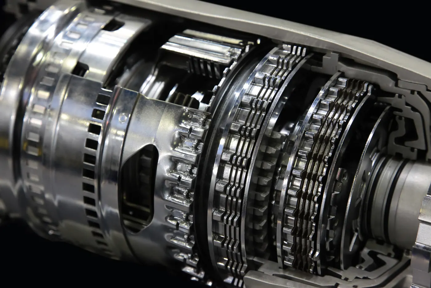 Close-up of an automatic transmission's clutch packs and planetary gears