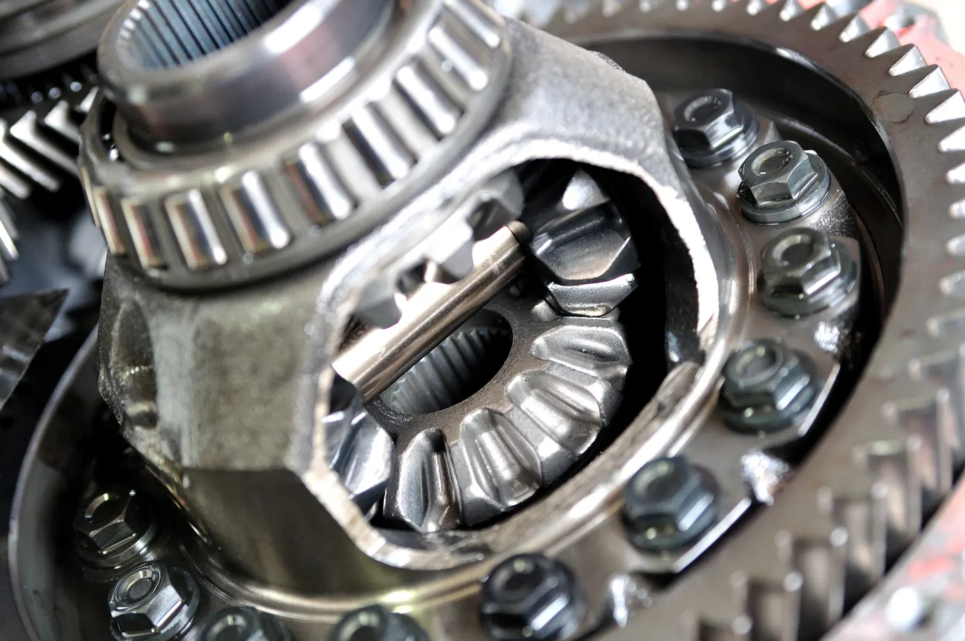 Open differential showing the spider gears, ring gear and bearings